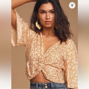 Lulus Wild Honey Mustard Yellow Floral Print
Twist-Front Top, NWOT, Size XS.